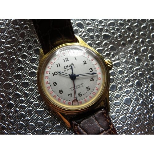 536 - Oris Big Crown hand wound wristwatch with pointer date. Gold plated case on leather strap. Stainless... 