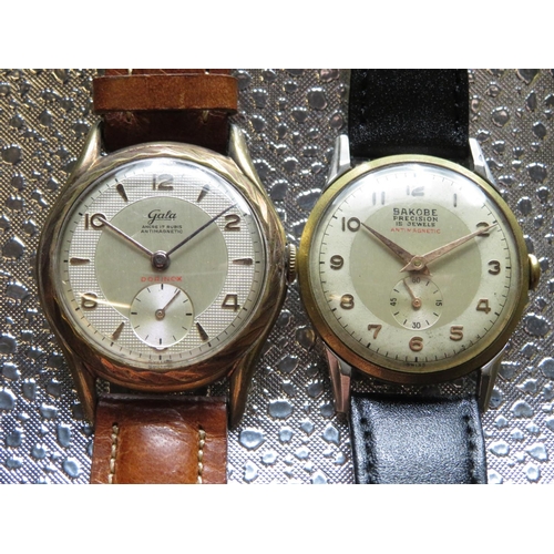 546 - Bakobe hand wound wrist watch. Gold plated case on leather strap. 15 jewel unadjusted movement, and ... 