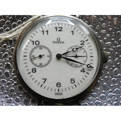 548 - Omega wristwatch, converted from pocket watch. Silver case stamped .900 and numbered 7758212. Omega ... 