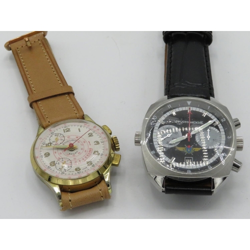 552 - Russian hand wound chronograph type wristwatch with date.  Stainless steel case on leather strap, an... 