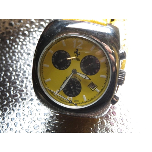 551 - Ferrari Automatic chronometer wrist watch with day, date and month.  Stainless steel case on leather... 