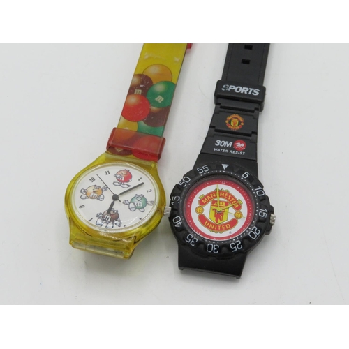 579 - Swatch type M & Ms quartz wristwatch and a  Manchester United quartz wristwatch (2)