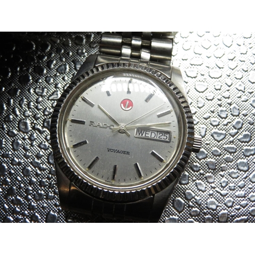 587 - Rado voyager automatic wristwatch with day and date, stainless steel case and matching bracelet, cas... 