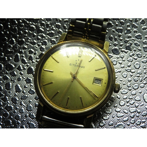 588 - Eterna automatic wristwatch with date, gold plated case on later bimetallic bracelet, case back numb... 