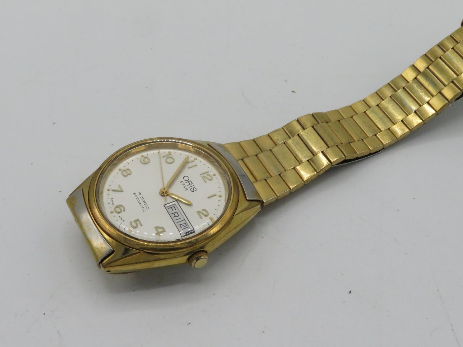 Oris Star automatic wristwatch with day date gold plated case on