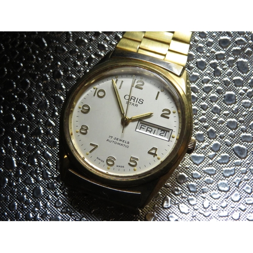 Oris Star automatic wristwatch with day date gold plated case on