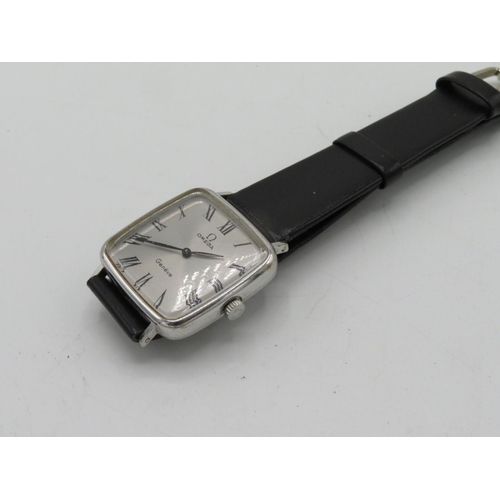 590 - Omega Geneve hand wound wristwatch rectangular chromium plated case on leather strap, case back stam... 