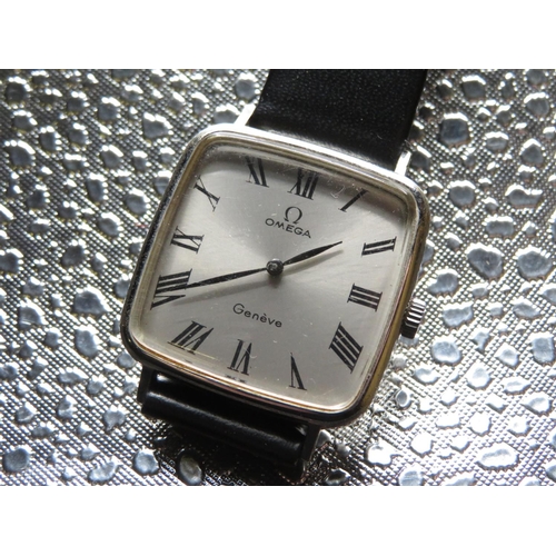 590 - Omega Geneve hand wound wristwatch rectangular chromium plated case on leather strap, case back stam... 