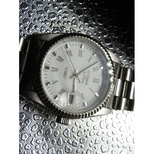 593 - Cyma Automatic wristwatch with day date. Stainless steel case on matching bracelet, crystal back etc... 