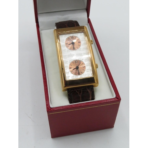 599 - Coca Cola twin dial quartz wristwatch, rectangular copper coloured plated case on leather strap, cas... 