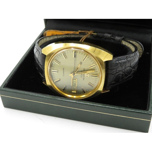 601 - Favre – Leuba Geneve automatic with day date. Gold plated case on leather stand with Favre – Leuba b... 