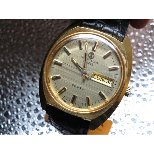 601 - Favre – Leuba Geneve automatic with day date. Gold plated case on leather stand with Favre – Leuba b... 