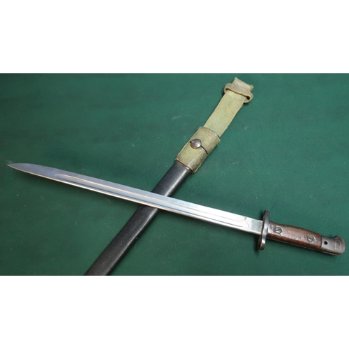 32 - Enfield 1907 bayonet with 17 inch blade stamped with crayoned VR Wilkinson 1907 complete with leathe... 