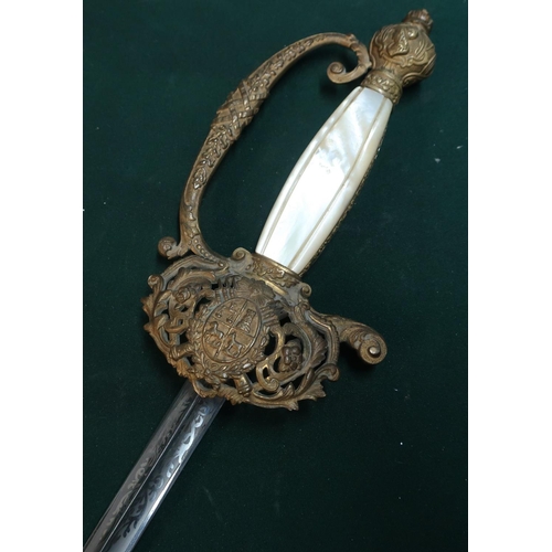 34 - Gilt hilted and mother of pearl gripped court style sword with 30.5inch triform blade with various e... 