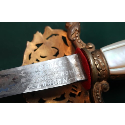 34 - Gilt hilted and mother of pearl gripped court style sword with 30.5inch triform blade with various e... 