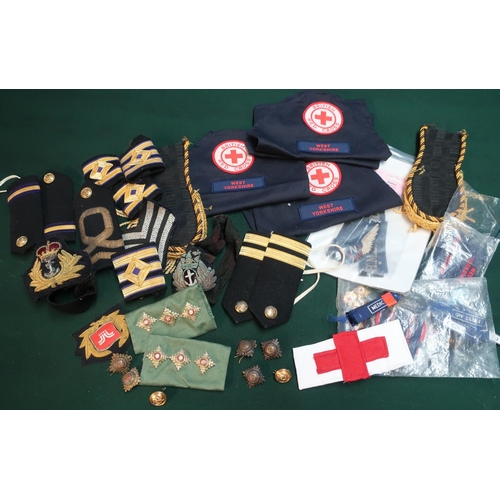 64 - Large selection of various military cloth and other insignia including naval tally's, RAF navigators... 