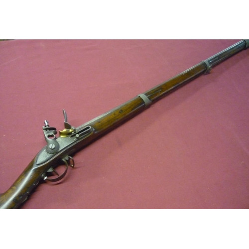 179 - Continental flintlock musket with 40 1/2 inch three banded rifled barrel (pitted), with steel mounts... 
