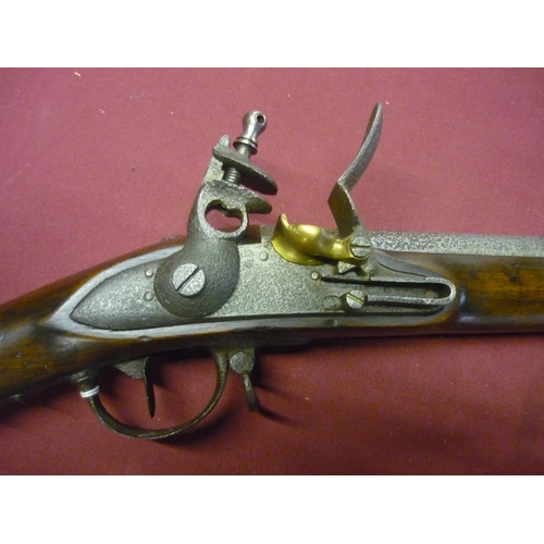 179 - Continental flintlock musket with 40 1/2 inch three banded rifled barrel (pitted), with steel mounts... 