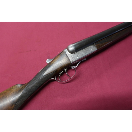 650 - T Wild 12B side by side shotgun with box-lock action, 30 inch barrels, 3 inch chambers, choke 3/4 an... 