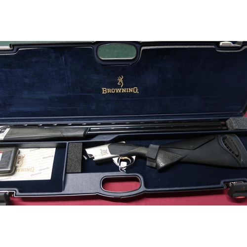 597 - Cased Browning Cynergy 12B over and under ejector shotgun with 32 inch barrels with extended and adj... 