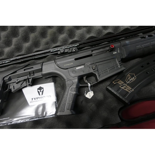 611 - Brand new ex shop stock Typhoon X11 FAC 12 bore shotgun with two detachable 10 round magazines and a... 