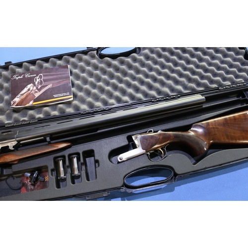 703 - Cased Akkar Triple Crown 20 bore triple barrel shotgun with 26 inch multi-choke barrels, single trig... 