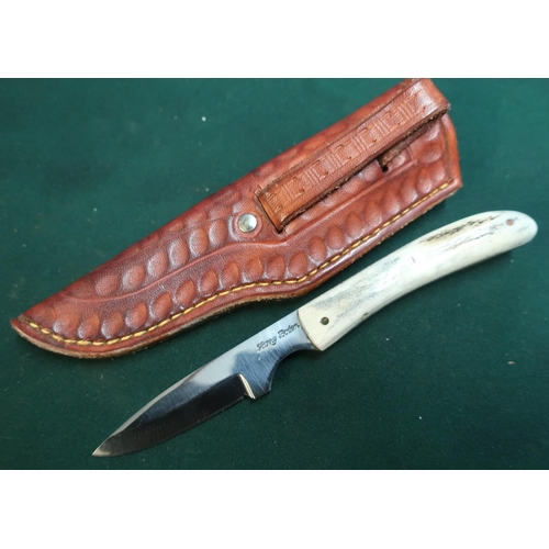 111 - Small two inch bladed Harry Boden sheath knife with two piece sambar horn grips