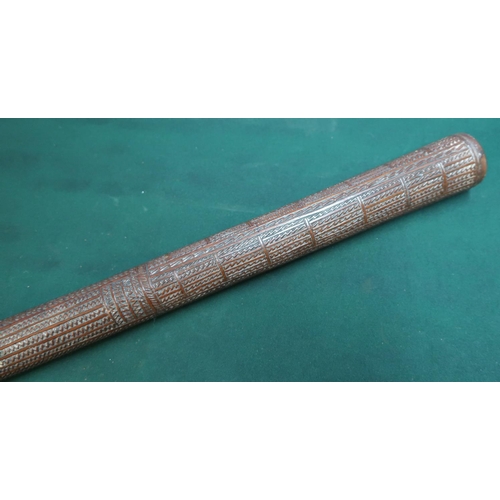 126 - Tonga type carved wooden club, with full body zigzag carving, of tapering form, base mounted with wh... 