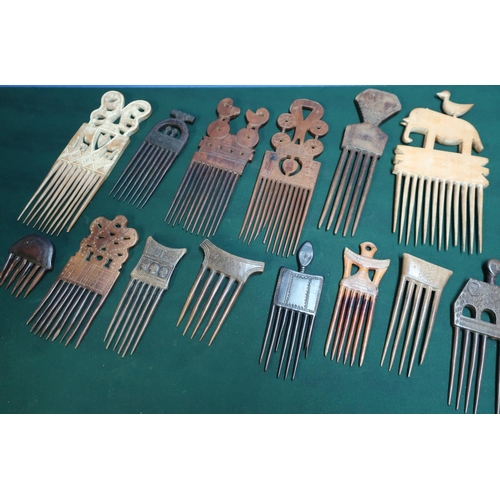 133 - Collection of fourteen various assorted African carved wood native combs of various sizes and design