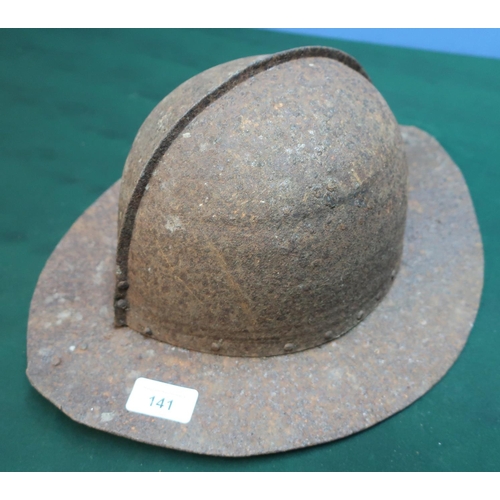 141 - An English Civil War style iron helmet complete with two Indian Tulwar sword hilts