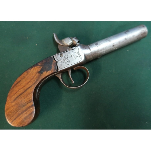 147 - 19th C percussion cap pocket pistol with 3 inch turn off barrel and engraved scrollwork to the top