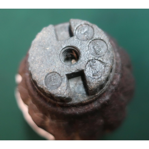 161 - Fragmented half section of a Mills hand grenade, complete with alloy base plug