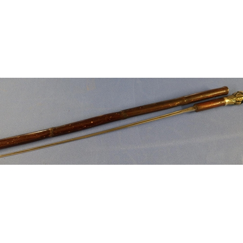 180 - Early to Mid 20th C bamboo sword cane with 25 inch fullered blade marked Wilkinson made in England w... 