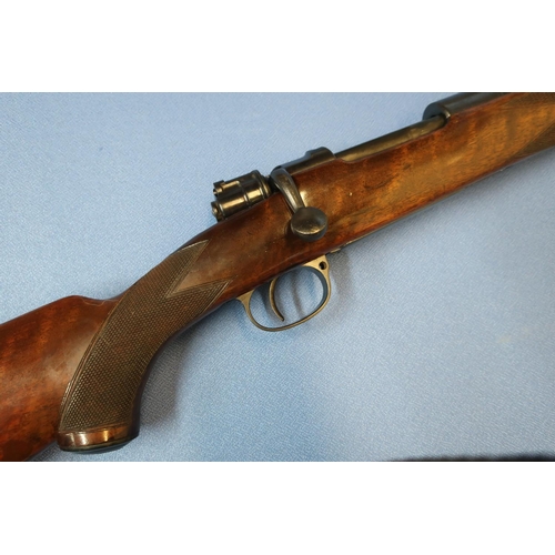 571 - Cogswell & Harrison .275 H&H Magnum bolt action rifle, with fixed fore and adjustable rear leaf sigh... 