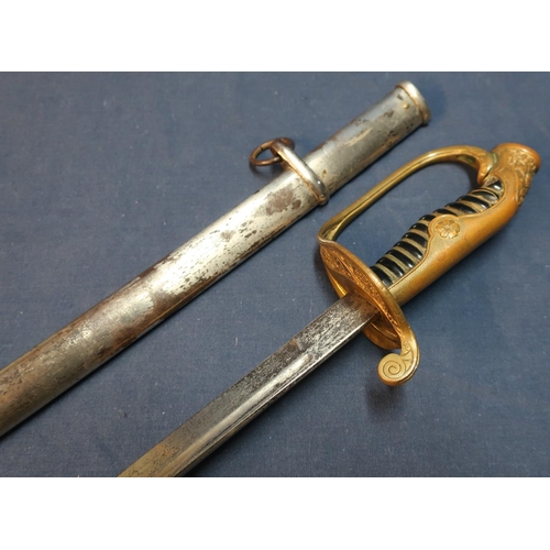 93 - Circa 1940's Japanese military officers sword with 28 1/2 inch slightly curved single fullered blade... 