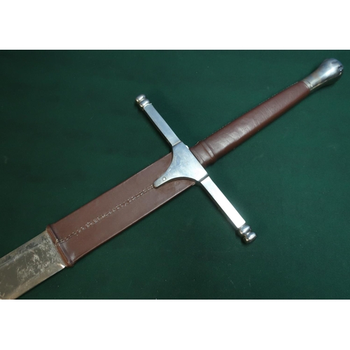 72 - Extremely large decorative broad sword with steel cross piece, leather bound grip and first section ... 