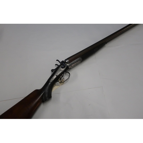 744 - W M Moore & Co. 10 bore side by side hammer gun with double trigger and 32 inch barrels, with 16 inc... 