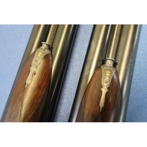 588 - Cased pair of Hussey & Hussey 12B side by side sidelock ejector shotguns, with 28 inch barrels, 2 1/... 