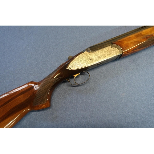 603 - Rizzini 12B over and under side plated ejector shotgun, with 28 inch barrels with raised top vented ... 