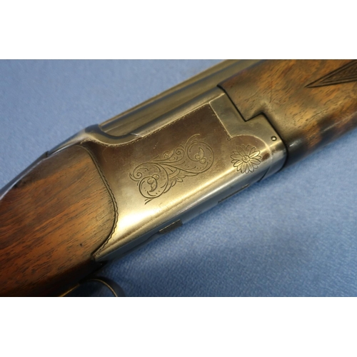 607 - Miroku 12B over and under ejector shotgun, with 26 inch barrels, choke 1/4 and 1/4, single trigger a... 