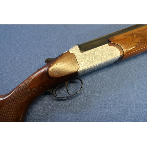 631 - Century 12B over and under shotgun, with 28 inch barrels, 14 1/4 inch pistol grip stock, serial no. ... 