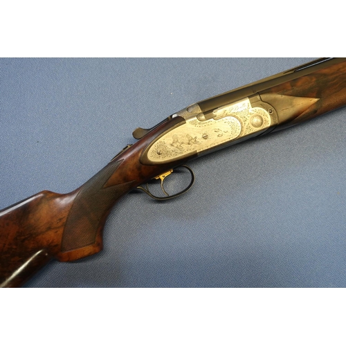 637 - Cased Beretta 687 EELL sporting 12B over and under sidelock ejector shotgun, with 28 inch multichoke... 