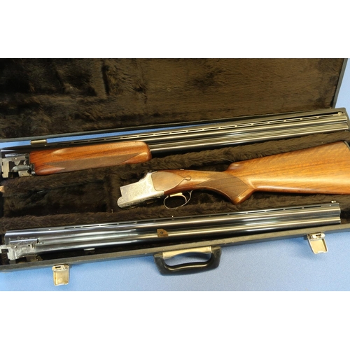 652 - Cased Miroku 12B over and under ejector shotgun, with additional set of barrels, with 30 inch barrel... 