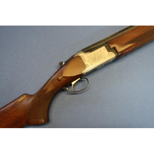 652 - Cased Miroku 12B over and under ejector shotgun, with additional set of barrels, with 30 inch barrel... 