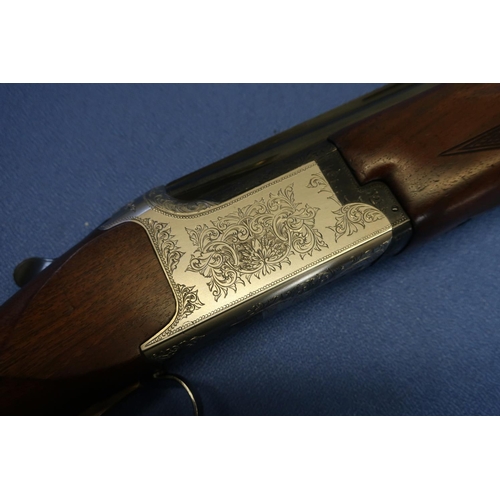 652 - Cased Miroku 12B over and under ejector shotgun, with additional set of barrels, with 30 inch barrel... 