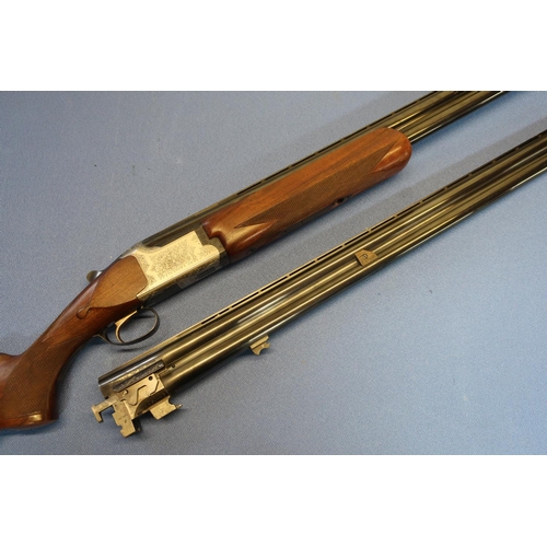 652 - Cased Miroku 12B over and under ejector shotgun, with additional set of barrels, with 30 inch barrel... 