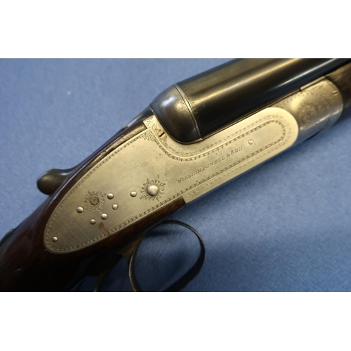 653 - Cased William Powell & Son 12B side by side sidelock ejector shotgun with 30 inch barrels, choke CYC... 