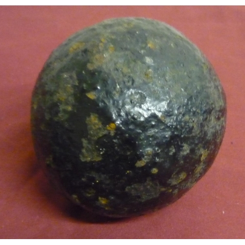 94 - Cast metal semi relic state cannonball (diameter approx  5 inches)