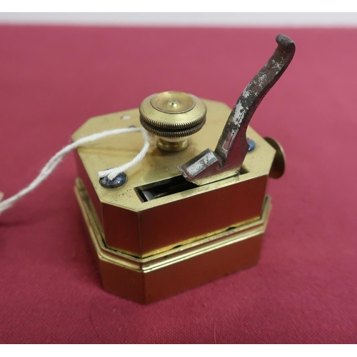 360 - Victorian brass scarifier with steel blades and handle, stamped A, in red leather box (H6.25cm)