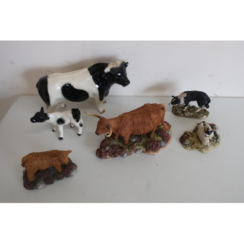 368 - Teviotdale Highland Cow & Calf, dog and two lambs, some with boxes and a ceramic model of a Friesian... 